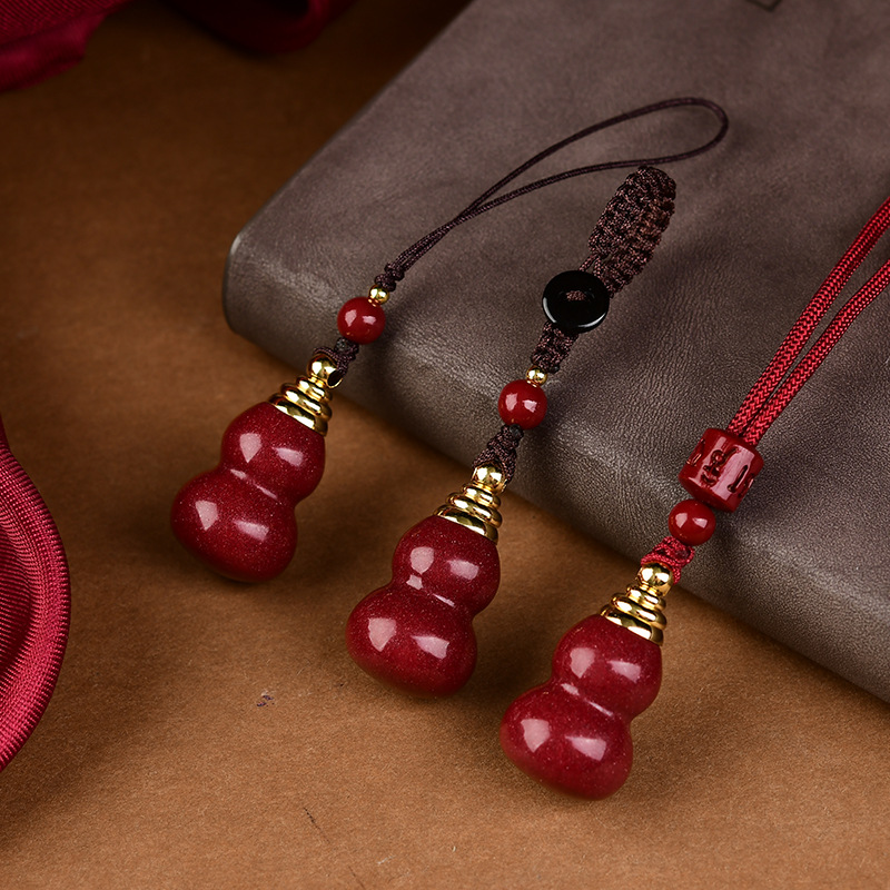 女性用の赤いシナバーペンダント,中空ボトルネックレス,キーバ - Phone Accessories Red のレビューと価格